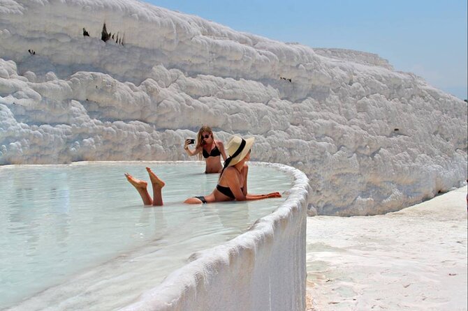 Full Day Pamukkale Guided Tour From Kusadasi With Thermal Pools - Entering Hierapolis and Pamukkale: Guided Highlights, Then Your Pace