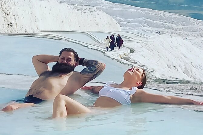 Full-day Private Pamukkale Tour from Kusadasi with Lunch - Pamukkale thermal pools: travertines, mineral water, and real footwork