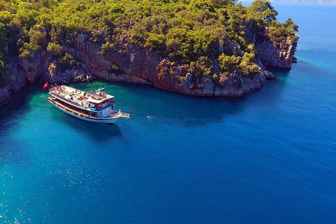 Kusadasi Boat Trip With Lunch And Hotel Transfer - The day on the water, bay stop by bay stop