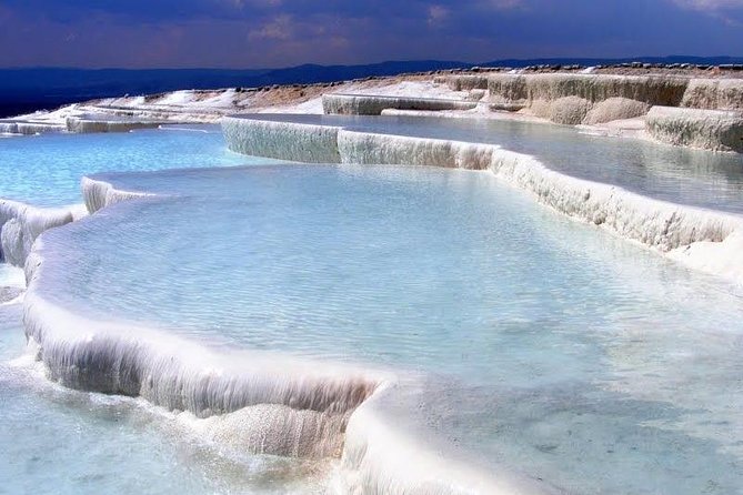 Pamukkale Small Group Tour From Kusadasi or Selcuk - Stop 1 at Hierapolis Theater Area: Odeon, Roman Baths, and Early Christian Context